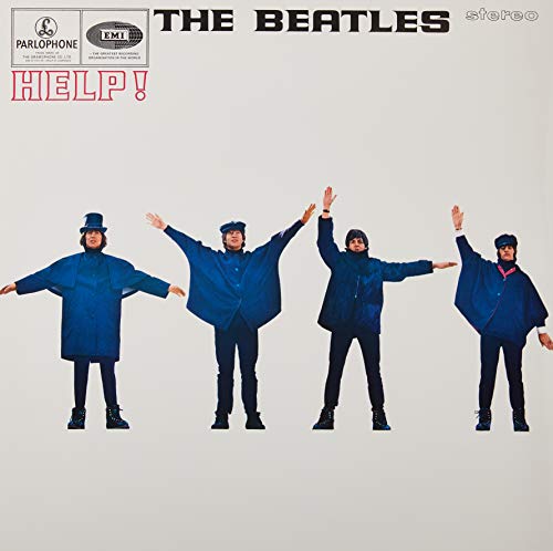 The Beatles posing in blue capes on the Help! album cover against a white background.