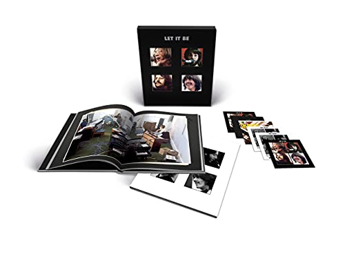The Beatles "Let It Be" CD package with booklet and photographs.