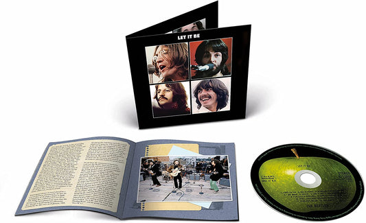 The Beatles "Let It Be" CD, open case with booklet and disc.