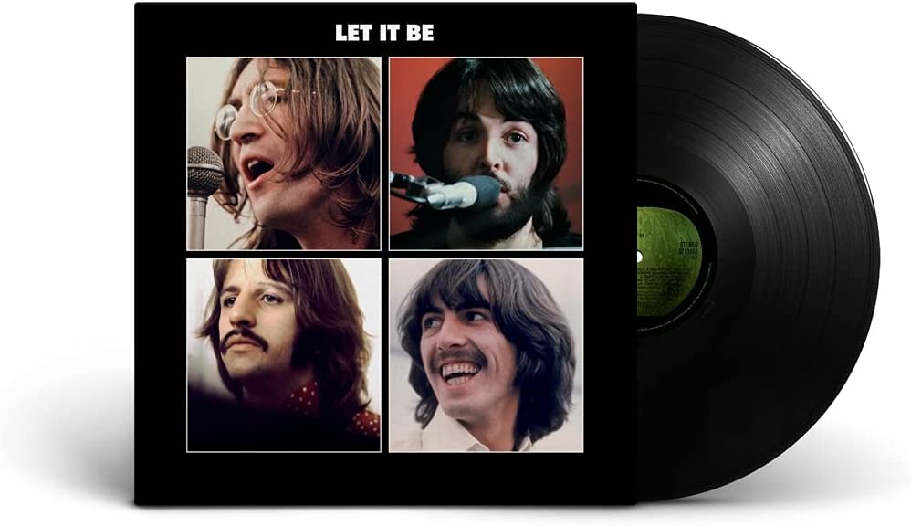 "Black vinyl record with 'Let It Be' album cover featuring The Beatles' portraits."