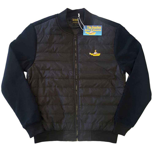 Man wearing a black quilted jacket with a Yellow Submarine patch.