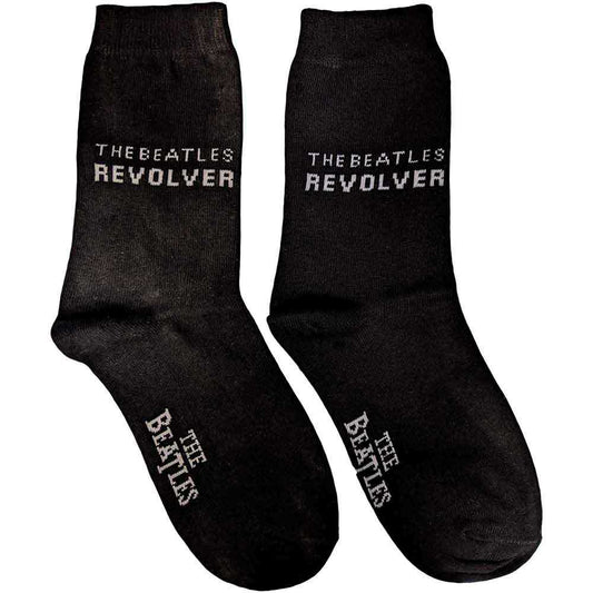 Black sock with white text reading "The Beatles Revolver.