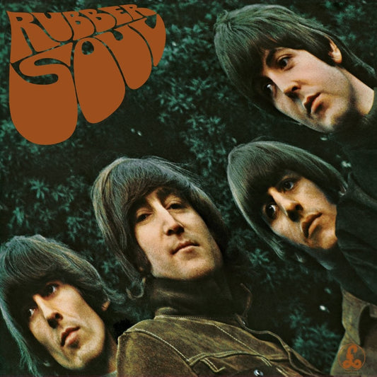 The Beatles’ “Rubber Soul” album cover with four band members’ portraits.