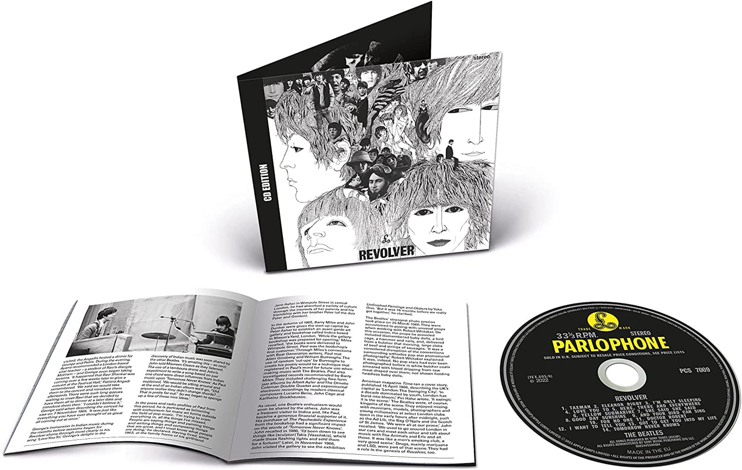 The Beatles Revolver CD album case, open booklet, and disc on a white background.