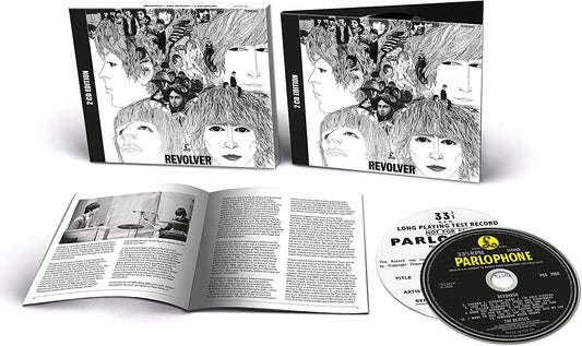 The Beatles" Revolver LTD 2CD edition, open to reveal inner artwork and record label.
