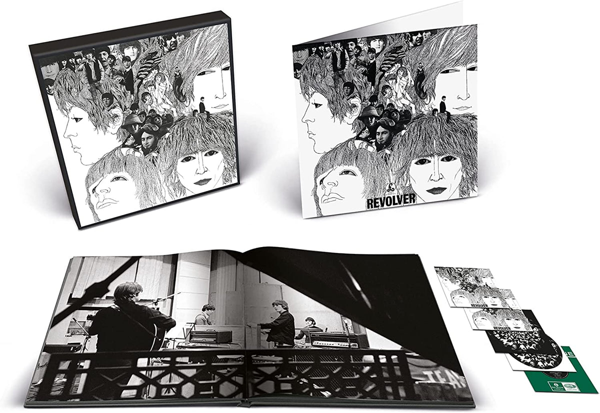 "Black and white Beatles Revolver CD boxset with artwork and booklet."