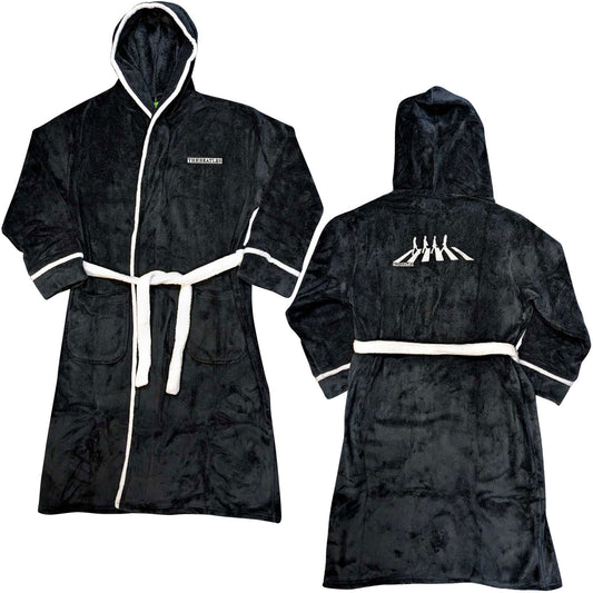 Man wearing a black, hooded bathrobe with white trim.