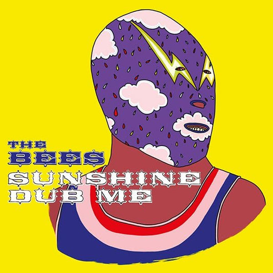 Album cover for The Bees’ “Sunshine Dub Me” featuring a luchador illustration.