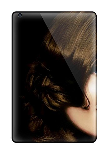 CD case with a close-up portrait of a person with brown hair.