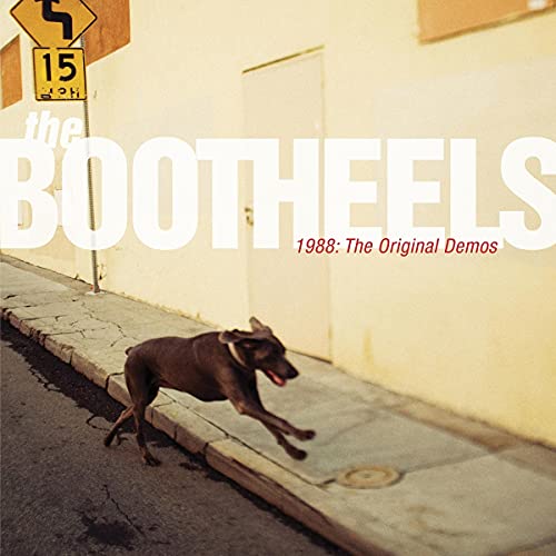 Vinyl record cover featuring band name, demos title, and a running dog.
