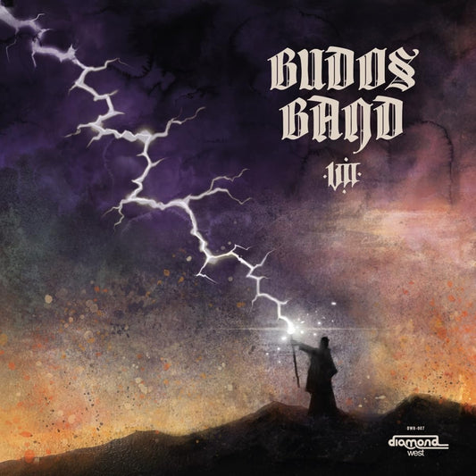 A figure stands on a hill holding a staff toward a bright lightning bolt.