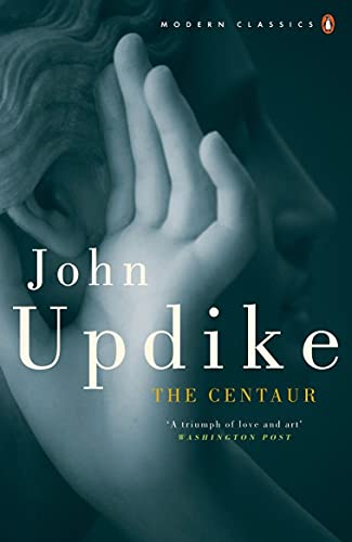 Book cover of "The Centaur" by John Updike, featuring a hand and face.