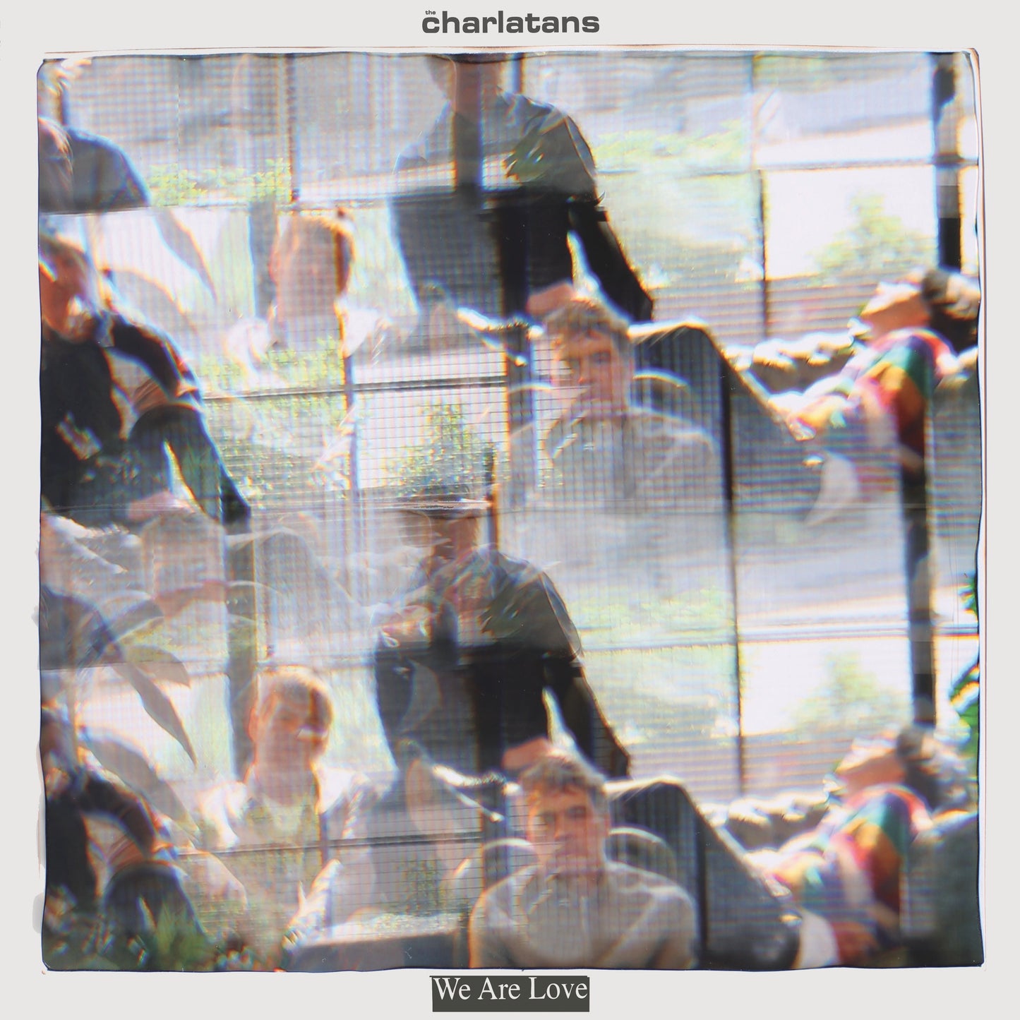 The Charlatans album cover, "We Are Love", with blurred figures.
