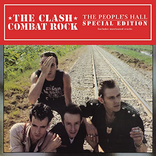 The Clash album cover featuring four band members by train tracks.