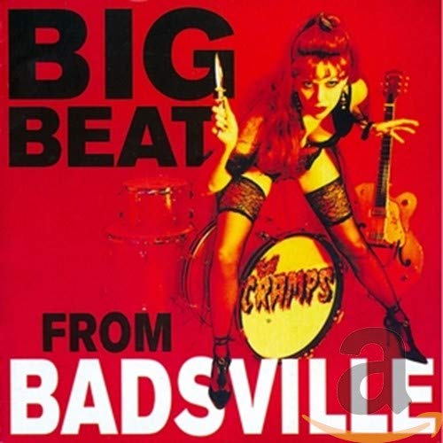 Album cover for The Cramps featuring a woman with a knife, guitar, and drums.