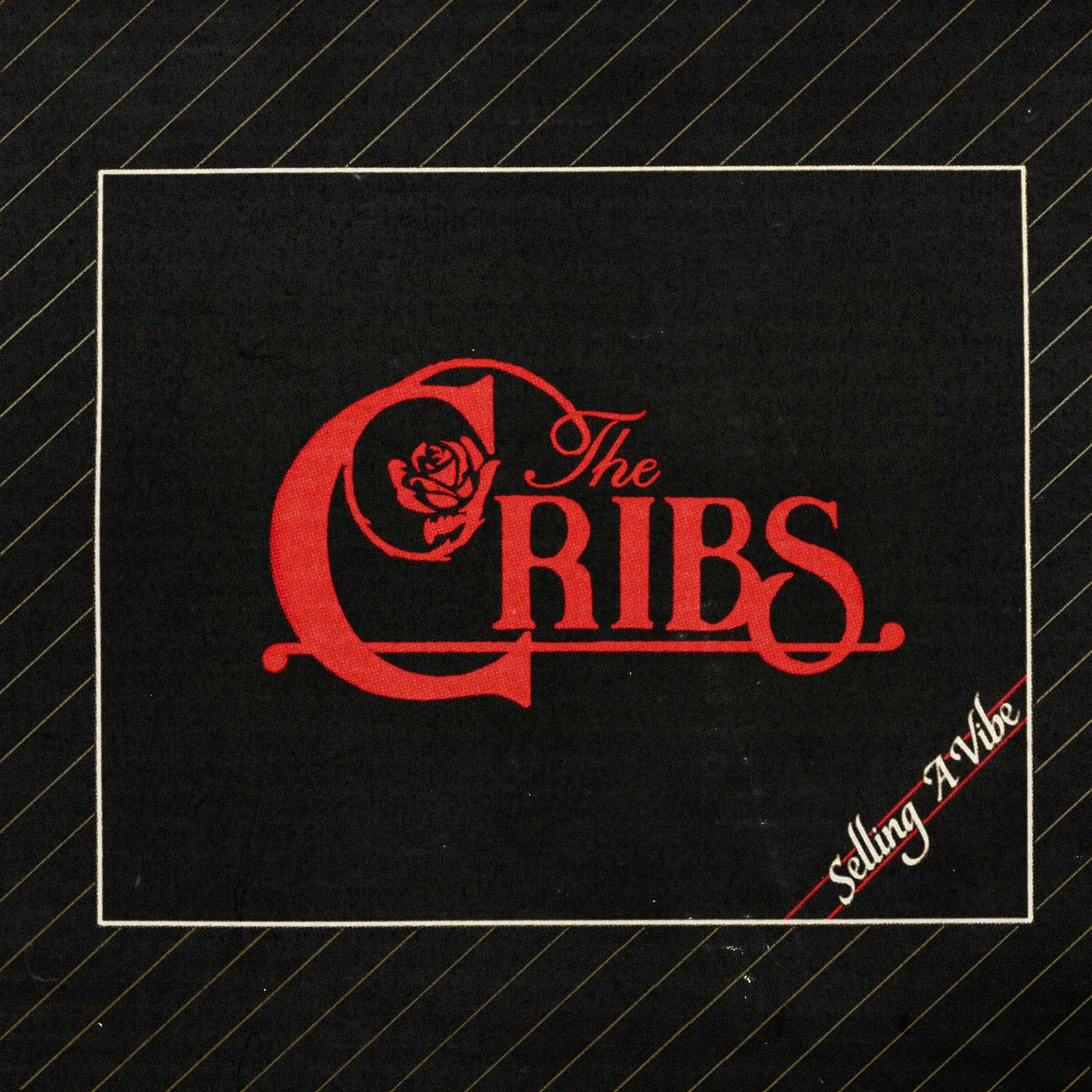 Album cover for The Cribs’ “Selling A Vibe” with red lettering and a rose.