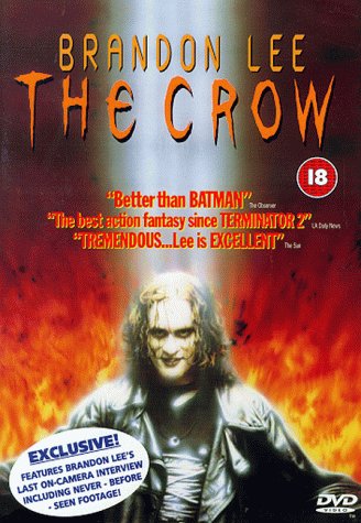 DVD cover for "The Crow" featuring Brandon Lee amidst flames.