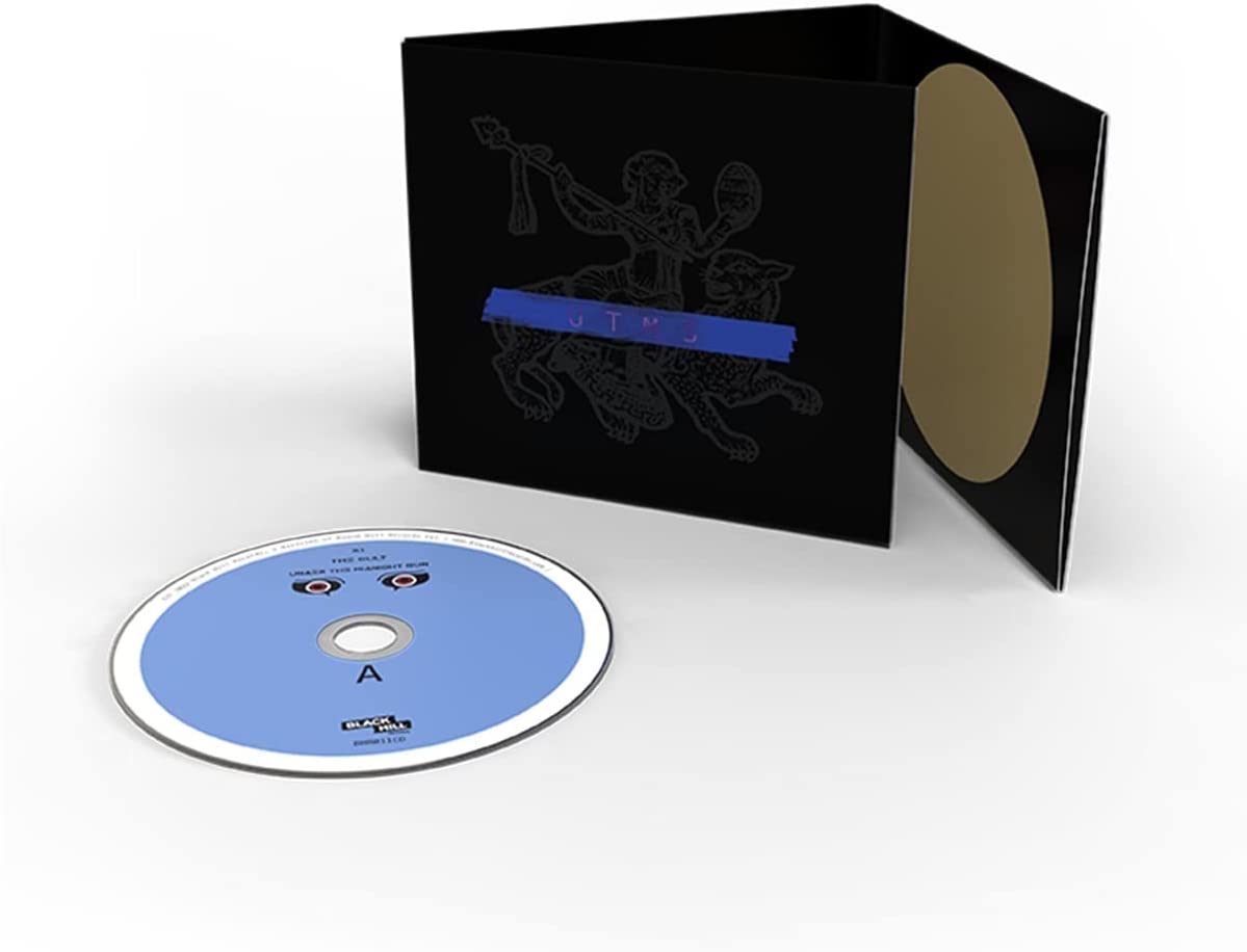 "CD case with a blue disc and black packaging featuring a leopard design."