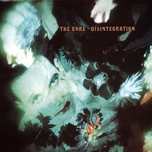 CD cover for The Cure’s *Disintegration*, featuring blurred floral and face imagery.