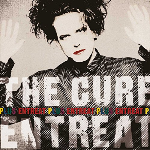 Robert Smith with hands raised, overlaid with The Cure Entreat Plus album text.