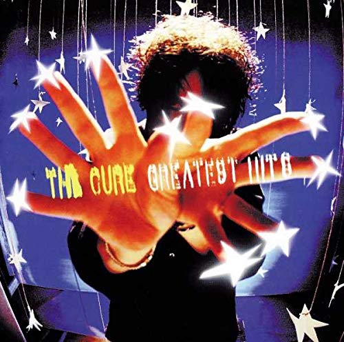 The Cure’s “Greatest Hits” CD cover with a hand and stars.