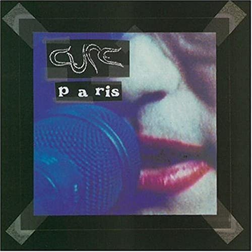 CD cover for The Cure’s “Paris” featuring a close-up face and microphone.