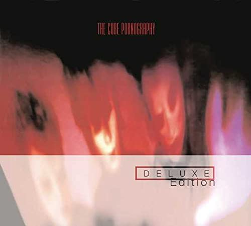 The Cure’s “Pornography” CD cover: abstract red and white blurred image.