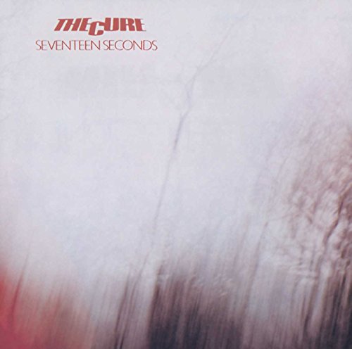 Album cover for The Cure's Seventeen Seconds featuring a blurred, misty, dark landscape.