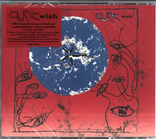 CD cover for The Cure’s “Wish” with abstract blue and red artwork.
