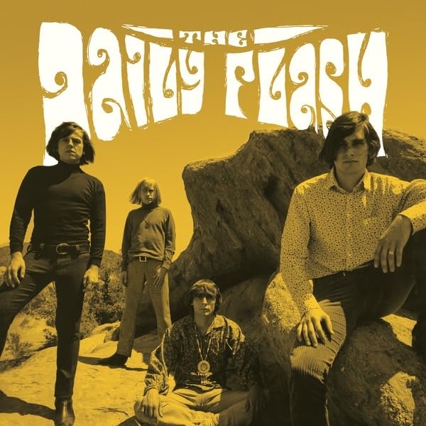 The Daily Flash album cover featuring a band portrait in a desert landscape.