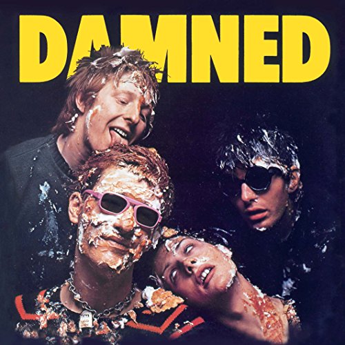 Album cover for The Damned, featuring four people covered in food.