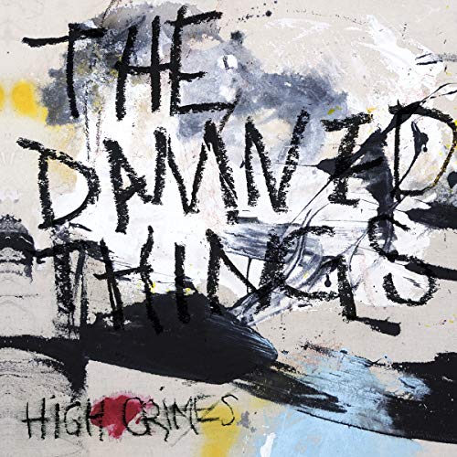 The image depicts an abstract album cover with black, white, and multicolored paint splatters.