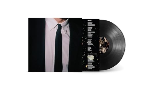 Vinyl record and album cover featuring a man in a suit.