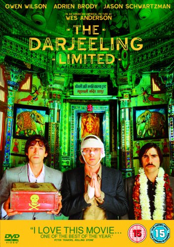 DVD cover for "The Darjeeling Limited" featuring three men in a colorful setting.
