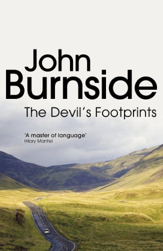 Book cover: winding road through rolling hills under a cloudy sky.