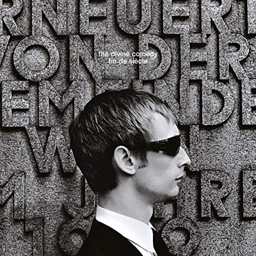 Black and white album cover featuring a man in sunglasses and textured text.