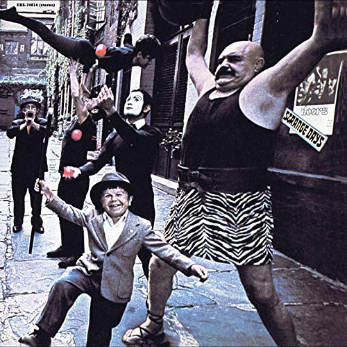 Vinyl record with cover art featuring a man and people on a street.