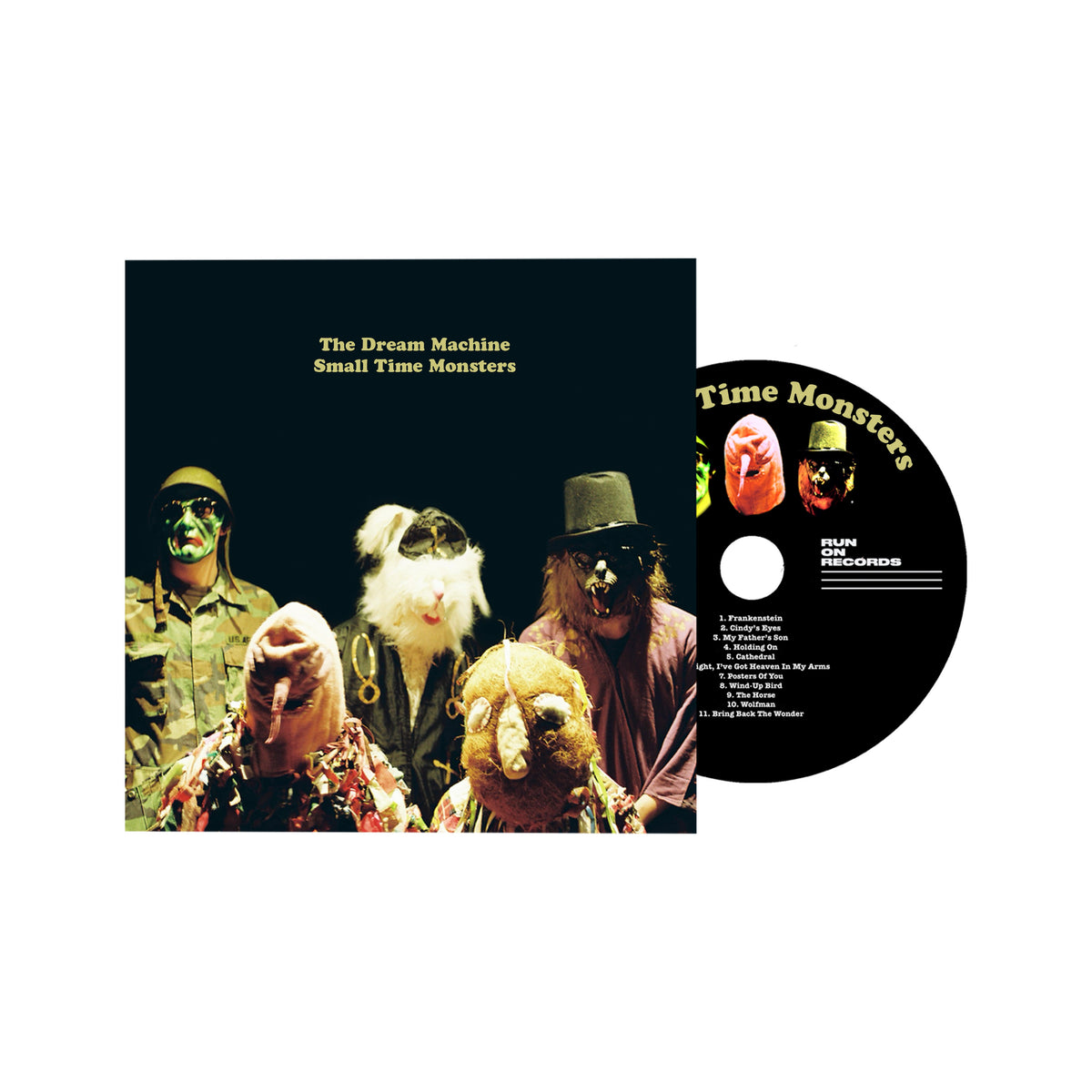 CD cover for "The Dream Machine" featuring three figures in hats.