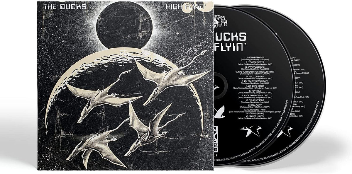 CD case for “The Ducks - High Flyin’” with flying reptile imagery.