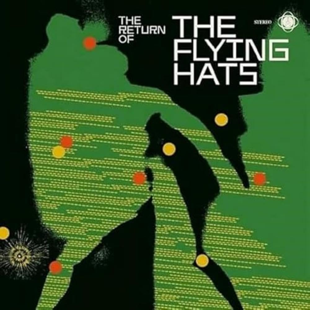 Vinyl record cover: green and black abstract face with yellow dots.