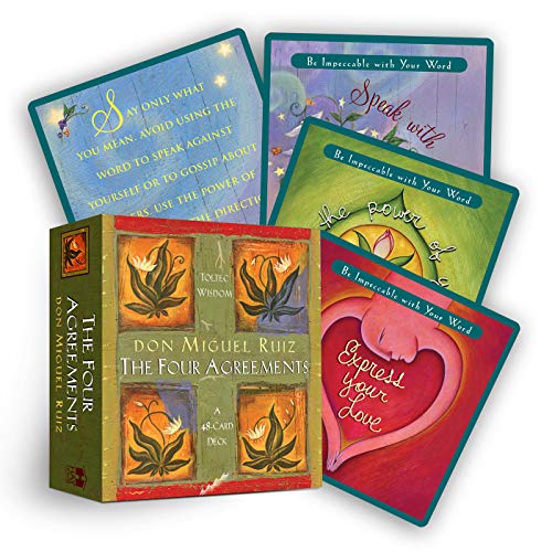 Colorful card deck with floral designs and inspirational text, titled "The Four Agreements.