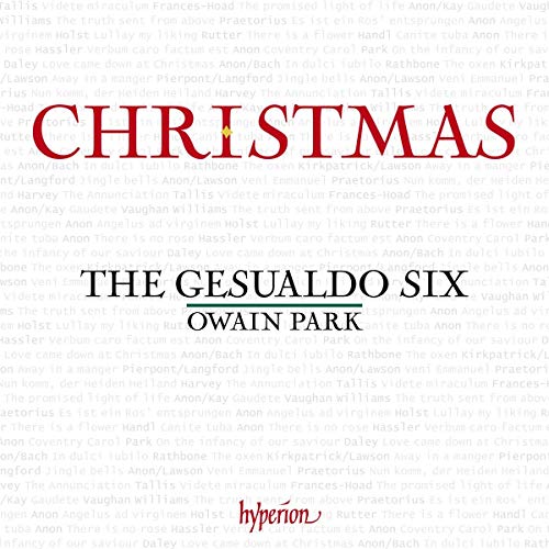 "Christmas album cover with red and black text on a light gray background."