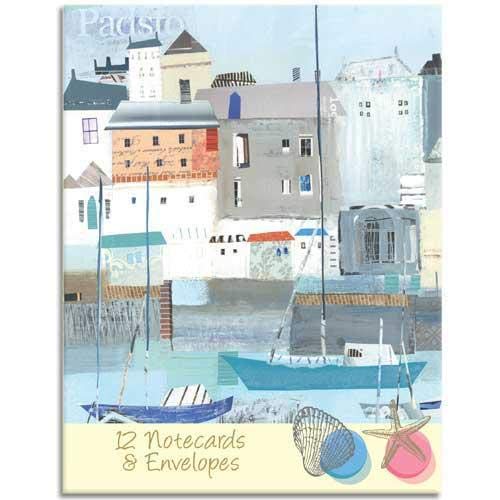 Colorful painting of seaside buildings and boats on a notecard wallet.