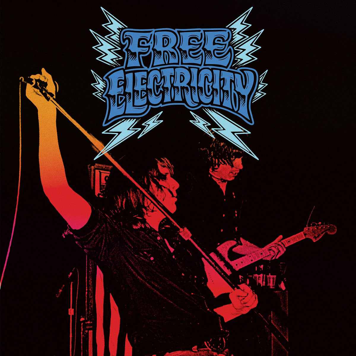 CD packaging for “The Go - Free Electricity” featuring a guitarist.