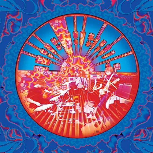 Psychedelic album cover featuring a band performing within a fiery, circular design.