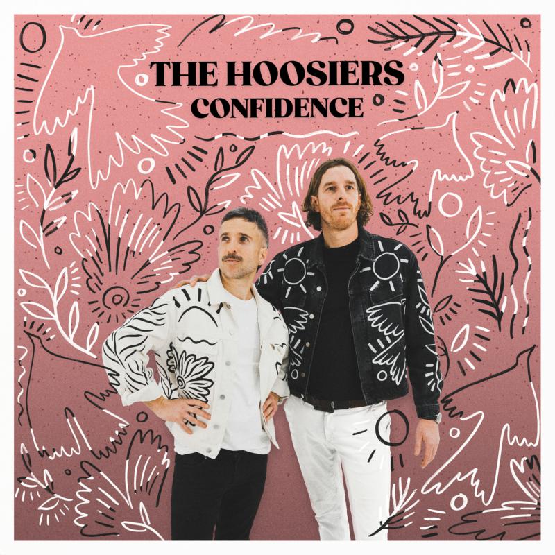 Two men stand against a pink background with white and black line art illustrations.