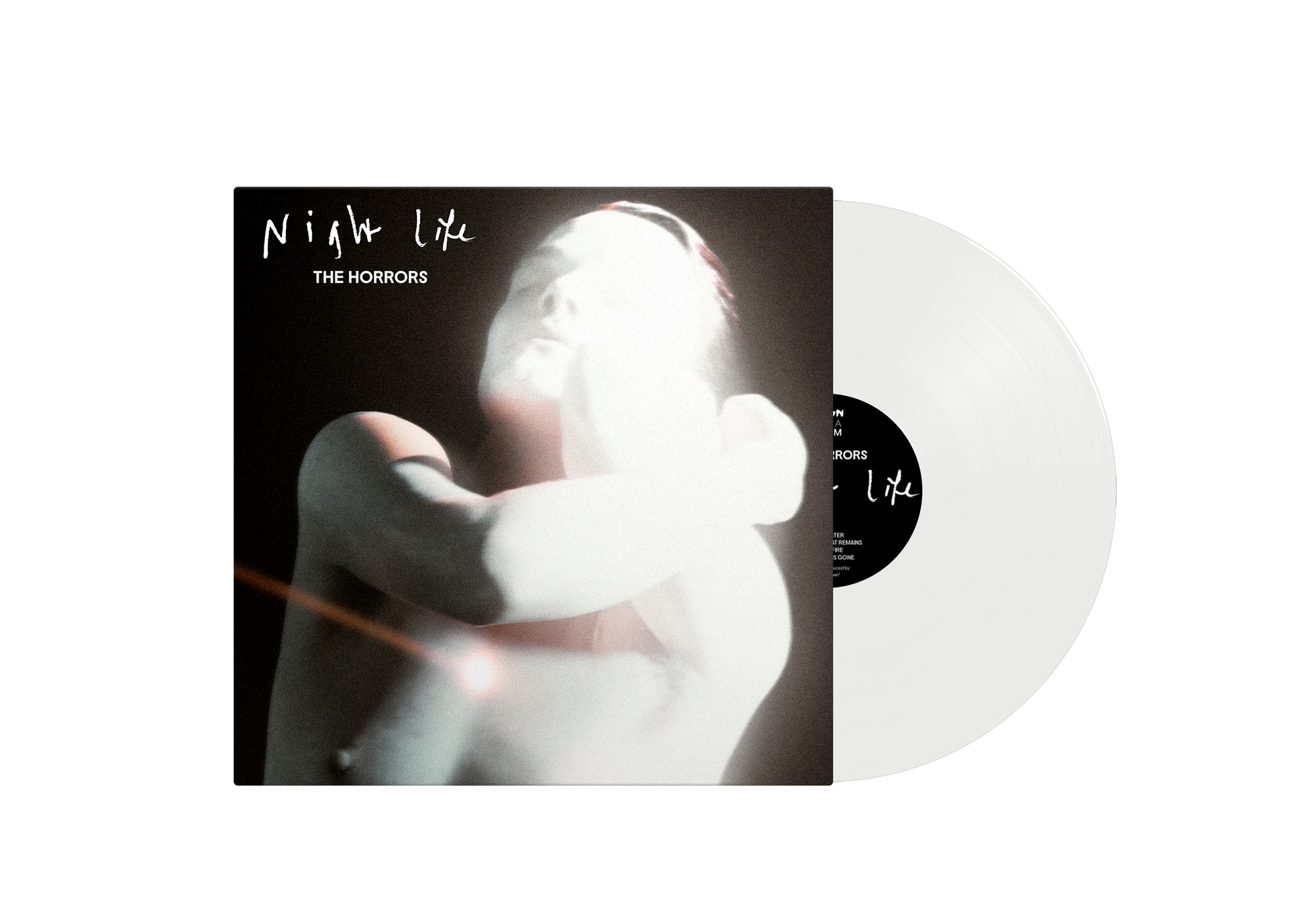 The Horrors Night Life album cover next to a clear vinyl record.