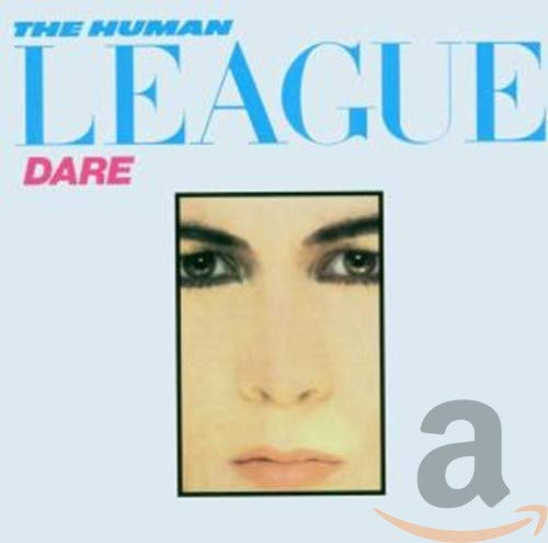 “Dare!” CD cover featuring a close-up of a person’s face and eyes.
