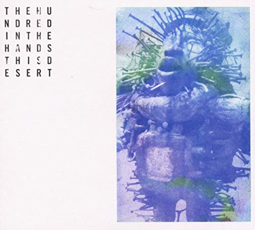CD cover for “Hundred In The Hands - This Desert” with abstract blue imagery.