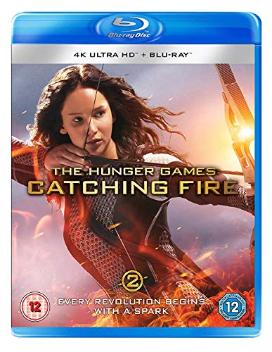 The Hunger Games: Catching Fire" Blu-ray cover featuring Katniss Everdeen with a bow.